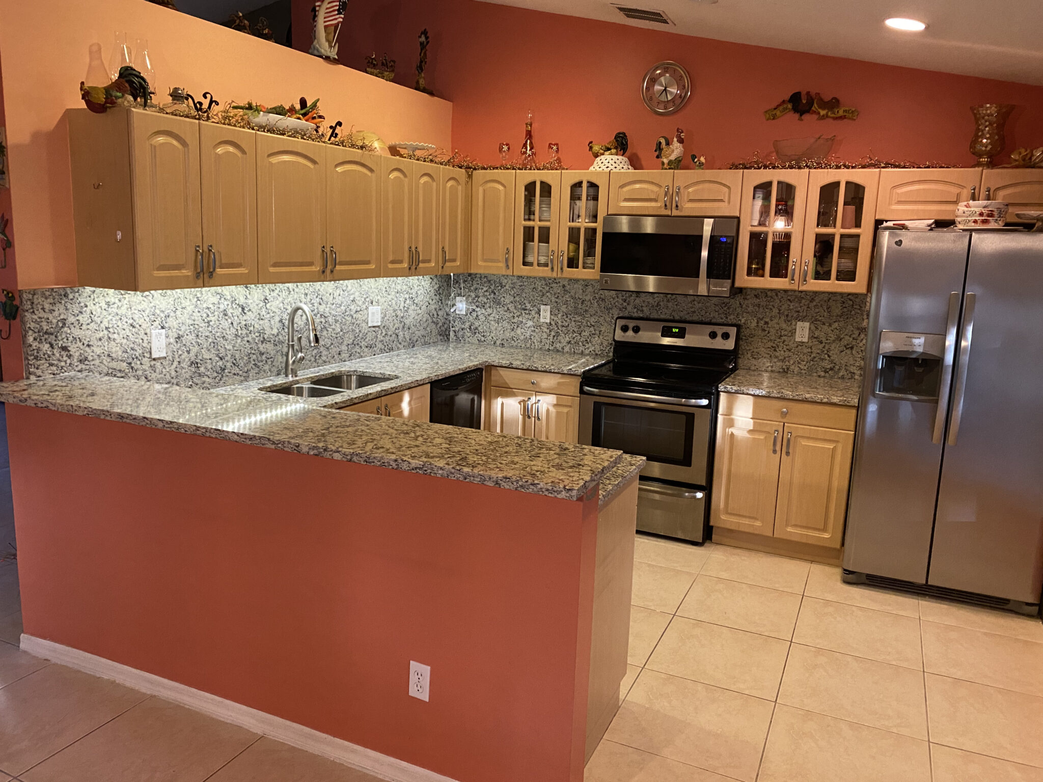 Granite countertop and full backsplash