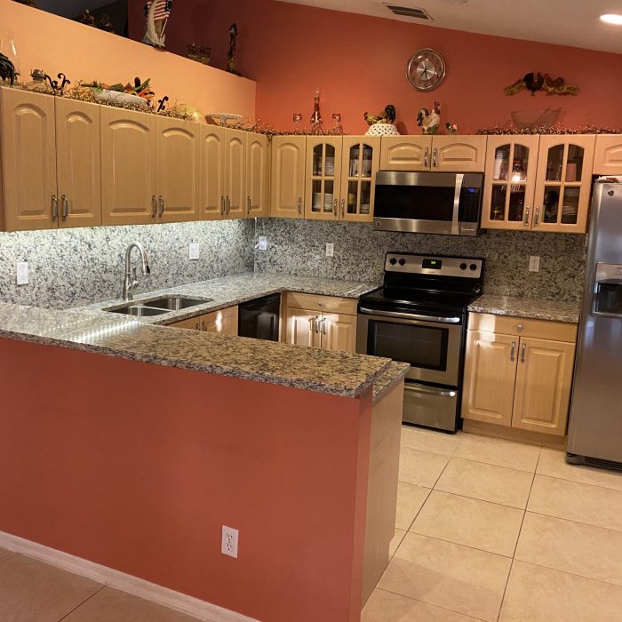 Granite countertop and full backsplash